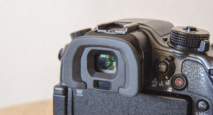The GH4's EVF has a rubber bumper, not an eyecup